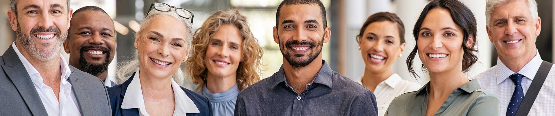 group of smiling office professionals